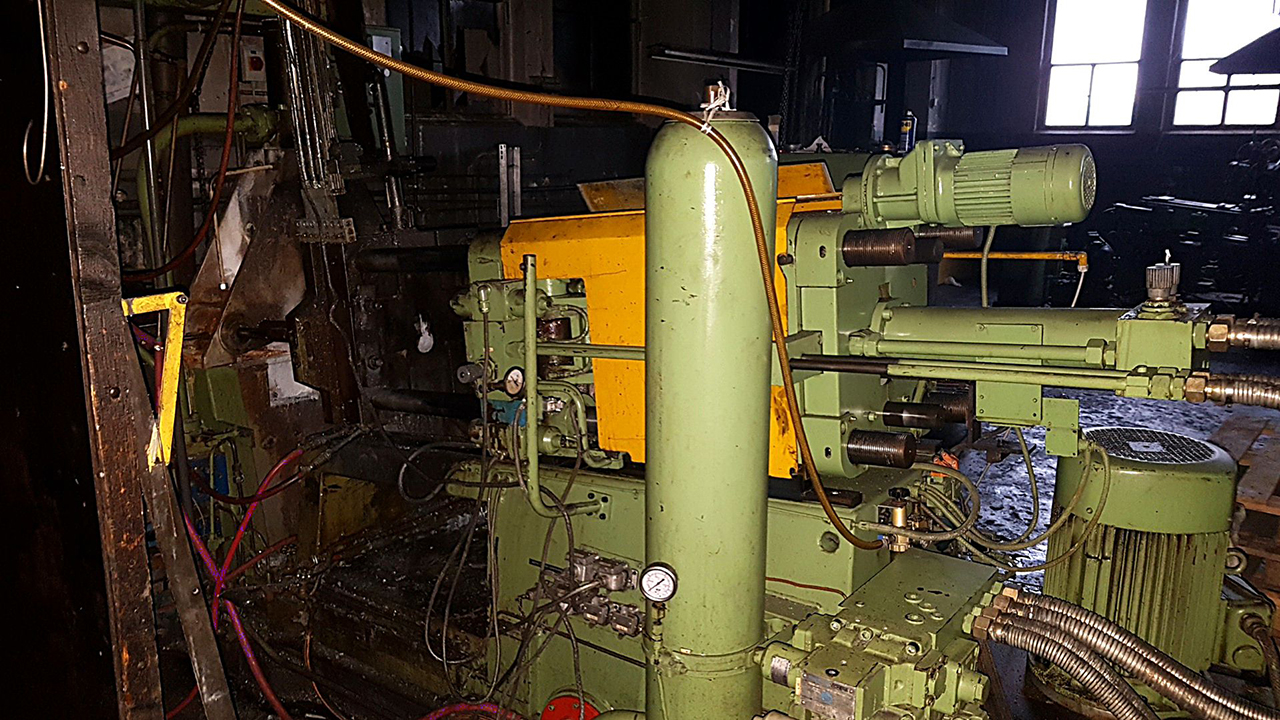 Frech DAW 63 hot chamber die casting machine WK1422, used