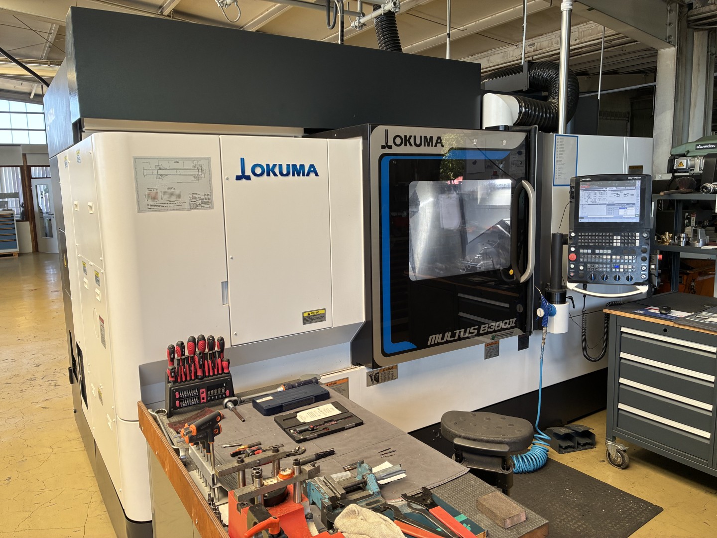 OKUMA MULTUS B300II-W CNC turning and milling centre BA2400, used